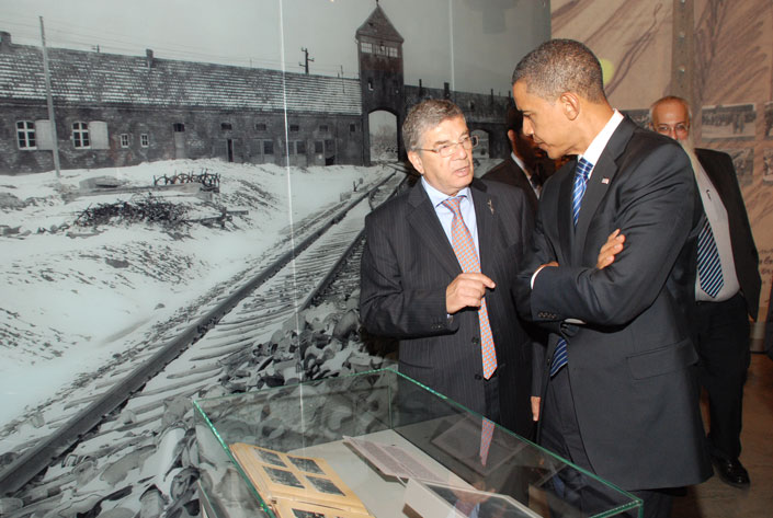 Senator Obama, accompanied by Chairman of the Yad Vashem Directorate Avner Shalev, views the Auschwitz Album in the Holocaust History Museum