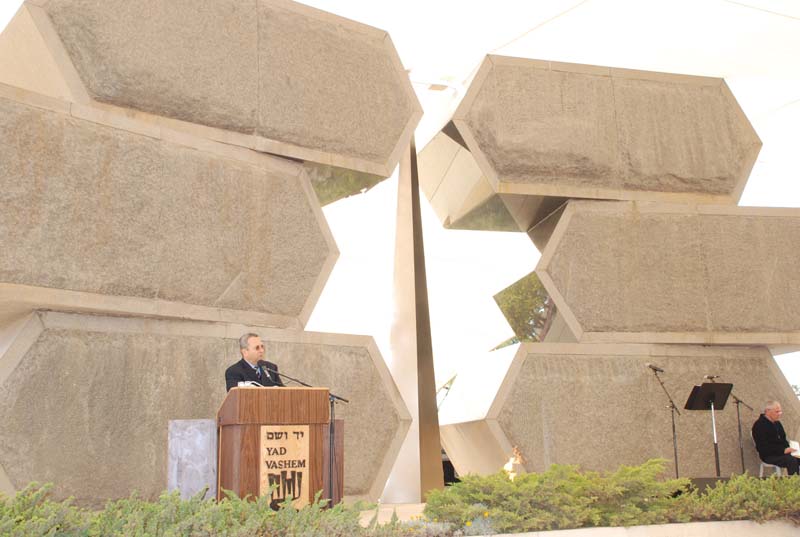 Minister of Defense Ehud Barak speaks during the ceremony