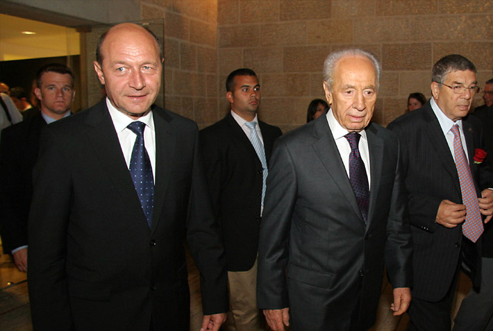 Entering Warsaw Ghetto Square (from left to right): President of Romania, HE Traian Basescu, President Shimon Peres, Chairman of the Yad Vashem Directorate Avner Shalev