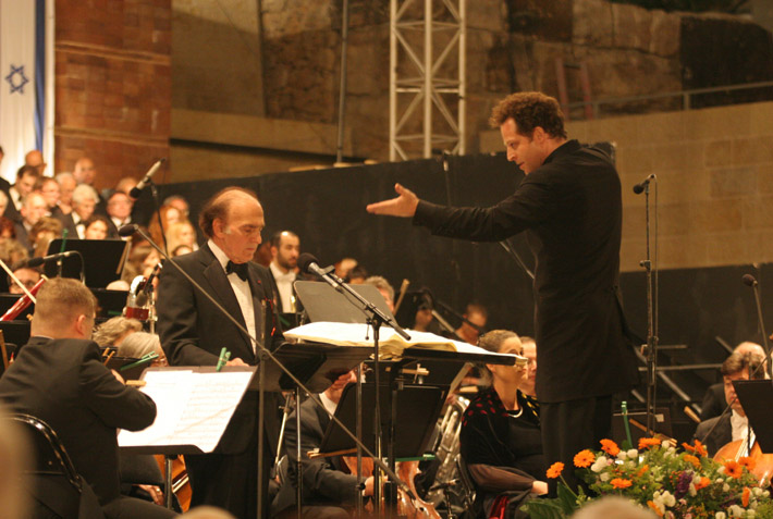 Maestro John Axelrod and Dr. Samuel Pisar during the performance