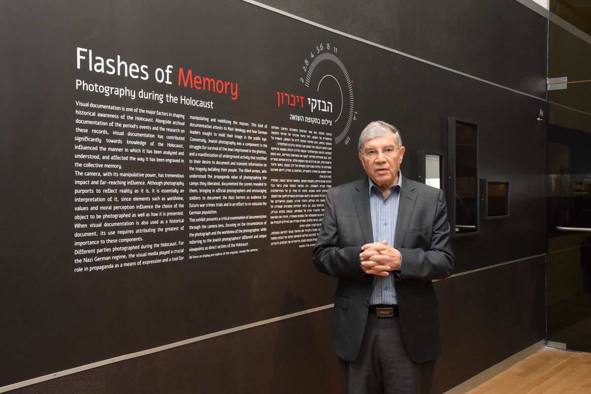 Yad Vashem Chairman Avner Shalev at the opening of the "Flashes of Memory" exhibition 