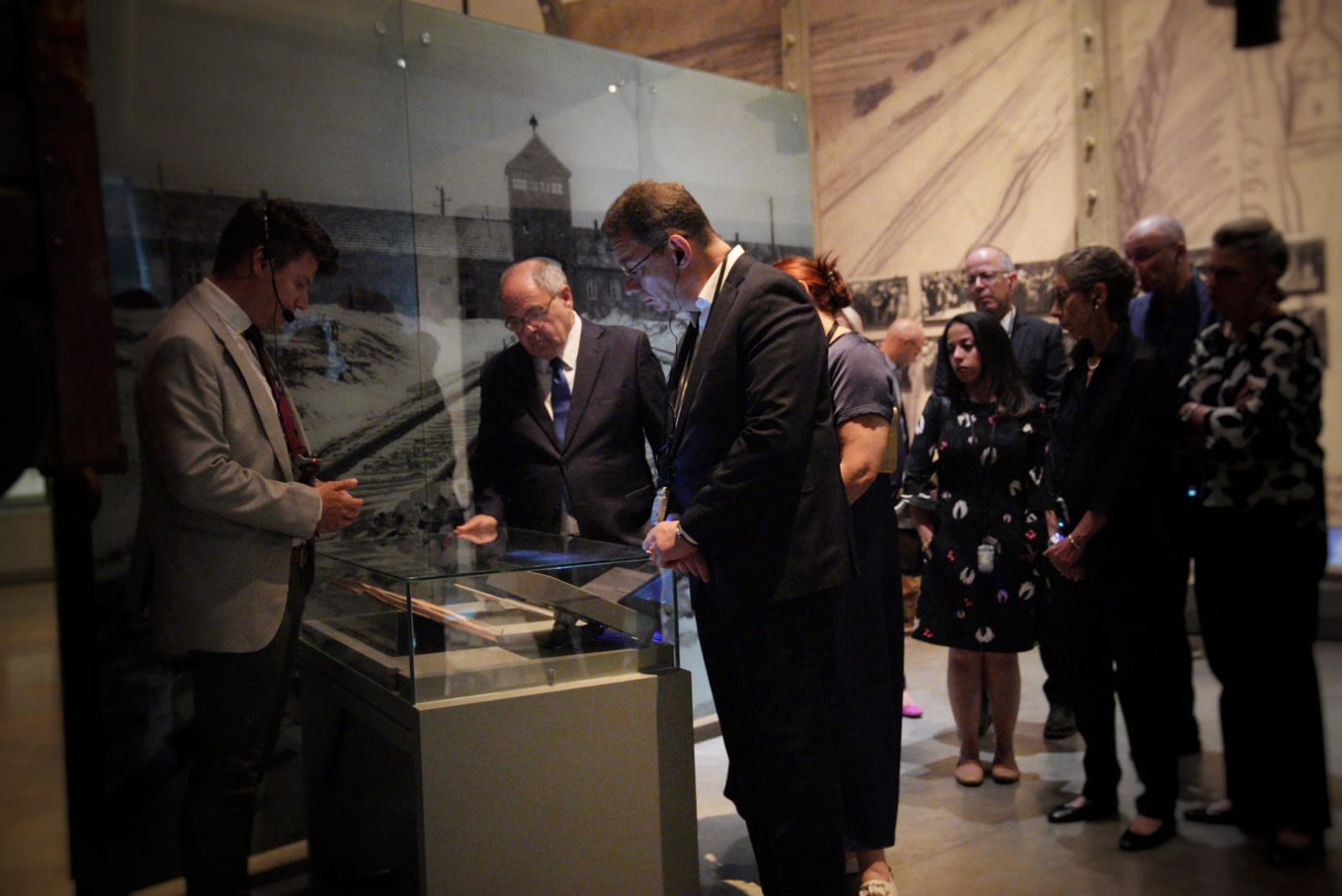 Dr. Albert Bourla views the Auschwitz Album on display in Yad Vashem's Holocaust History Museum
