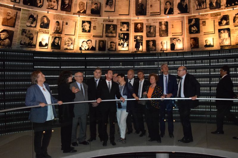 The French Prime Minister with members of his esteemed delegation heard about the Hall of Names, which today contains 4.6 million names of Holocaust victims