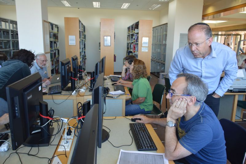 Archives Director Dr. Haim Gertner helps researchers access Yad Vashem's databases and resources