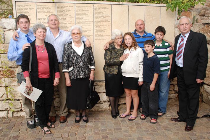 Survivor Frances Schaff with her family with Janina Woloszczuk (4th from left) and her son (1st right)