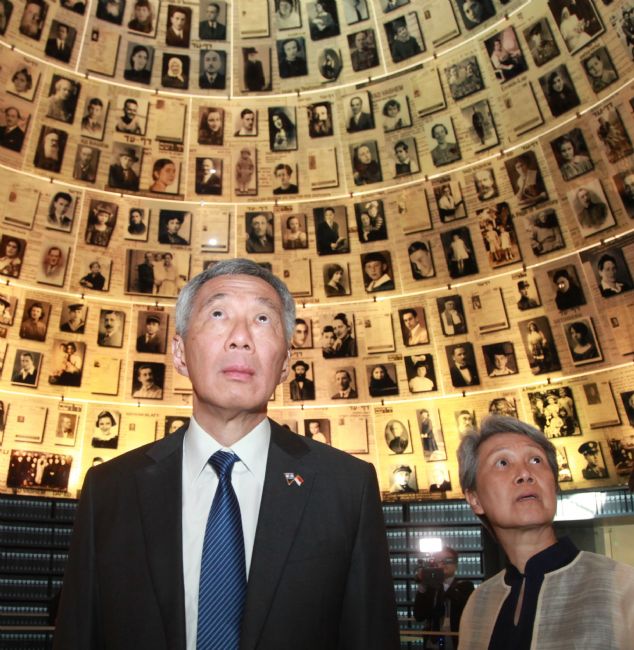 The Prime Minister and his wife in the Hall of Names - a memorial to the six million Jews murdered during the Holocaust