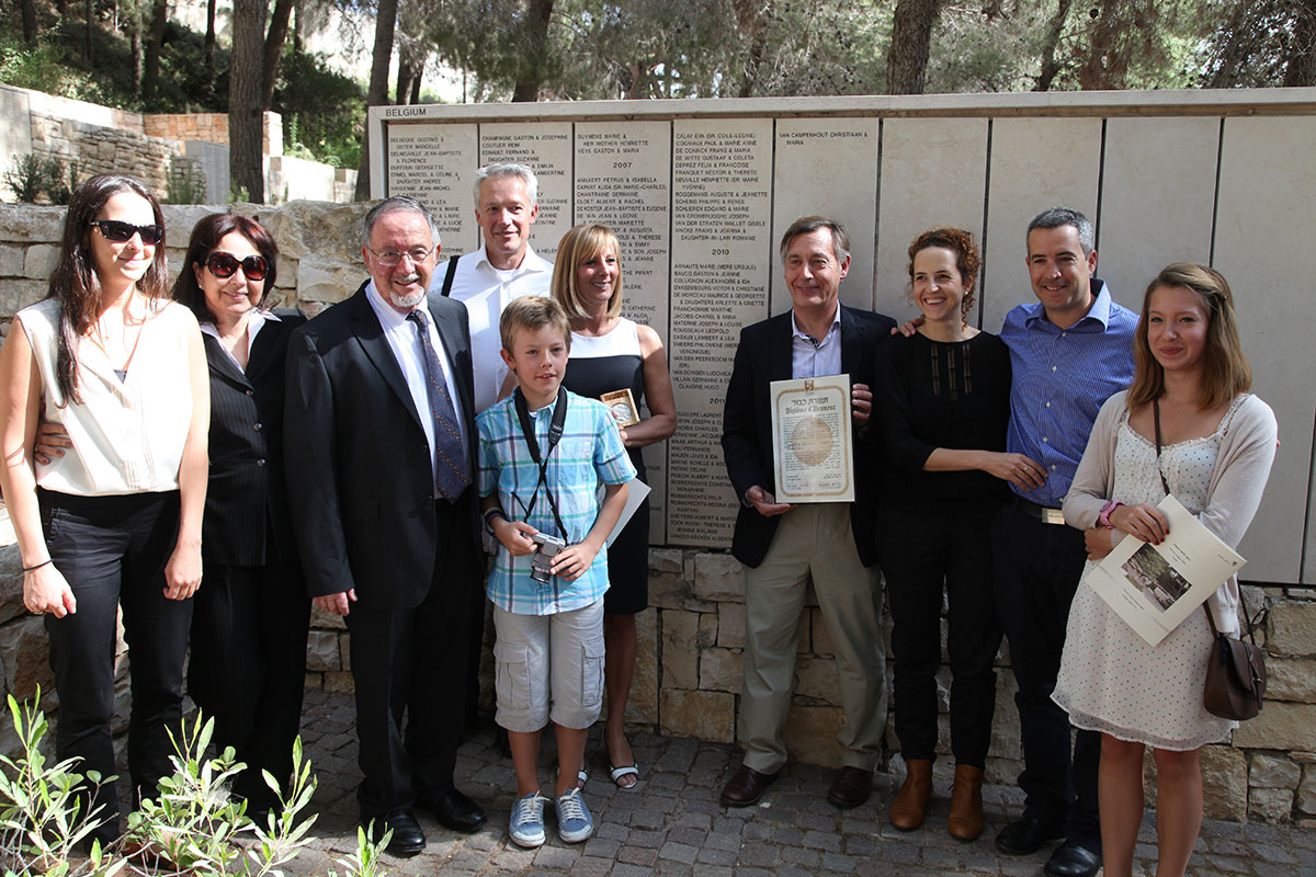 Materne and Shiffer families at the wall bearing the names of the rescuers, Yad Vashem, 1 November 2012