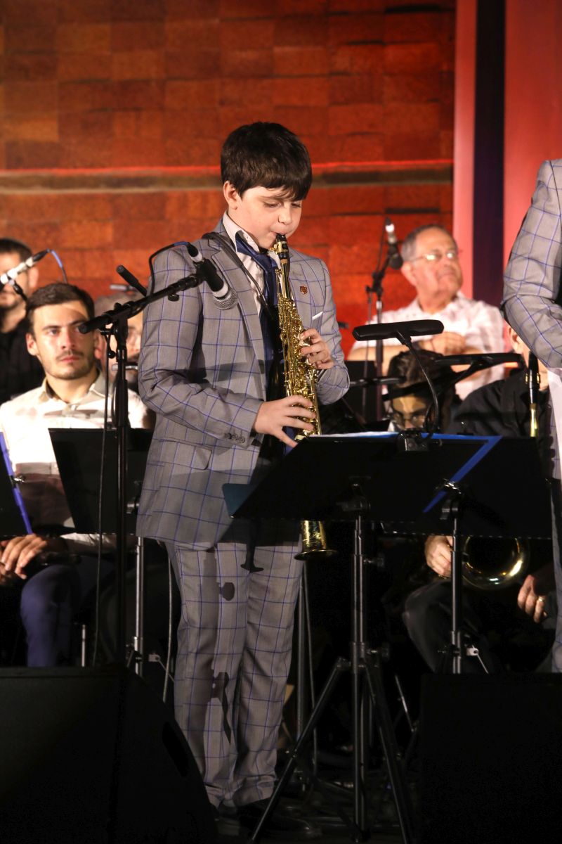 Child musician at the annual "Mashiv Haruach" concert at Yad Vashem