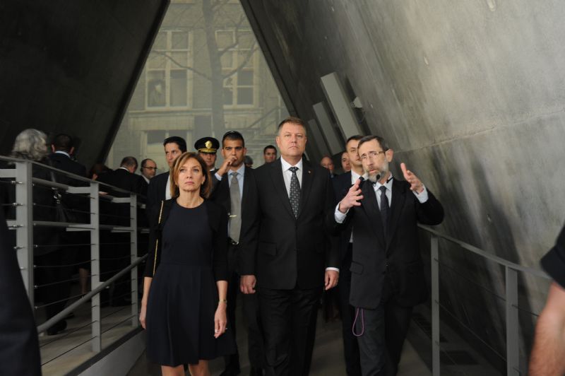 President Iohannis and his wife Carmen were guided through the Holocaust History Museum by Director of Yad Vashem's Hall of Names Dr. Alexander Avram (right).