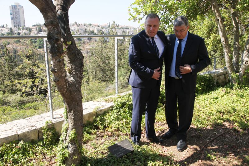Poland's Foreign Minister Grzegorz Scheytna (left) was accompanied by Yad Vashem Chairman Avner Shalev as he visited the tree dedicated to the Righteous Among the Nations "Zegota" wartime rescue organization