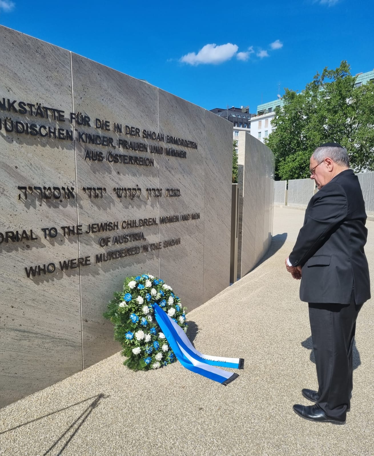 Yad Vashem Dani Dayan lays a wreath by Holocaust memorial in Vienna