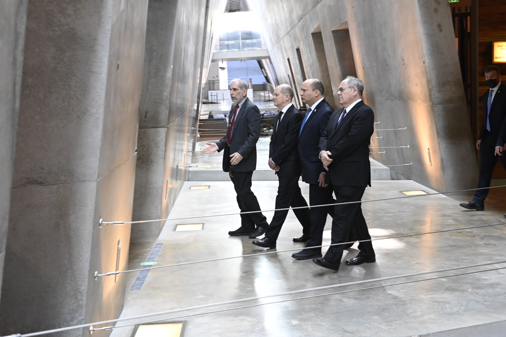 German Chancellor Olaf Scholz receiving a private tour of Yad Vashem’s Holocaust History Museum, along with Chairman Dani Dayan and Prime Minister Naftali Bennett