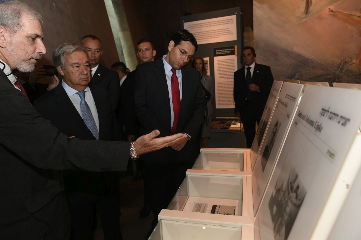 UN Secretary-General and Israeli Permanent Representative to the United Nations Ambassador Dani Danon view a display commemorating Portugese Diplomat and Righteous Among the Nations Aristides de Sousa Mendes