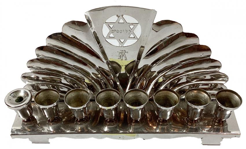 Hanukkah menorah that Bela (Dov Beer) and Iren Borgida  gave to their son-in-law Kalman Fried after he married their daughter Vera in 1941 in Oradea, Romania