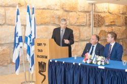 Yad Vashem Chairman speaking at the signing ceremony (Left to Right) Yad Vashem Chairman Avner Shalev, Ambassador Bardhyl Canaj and Dr. Ardit Bido.