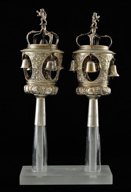 A pair of silver Torah finials with the inscription: “Donated by Jakob and Bertha Weinschenk” that were stolen during the Kristallnacht pogrom and returned to their descendants sixty years later