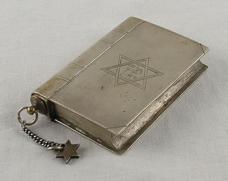 Chanukah Menorah in the shape of a prayer book, Lodz ghetto