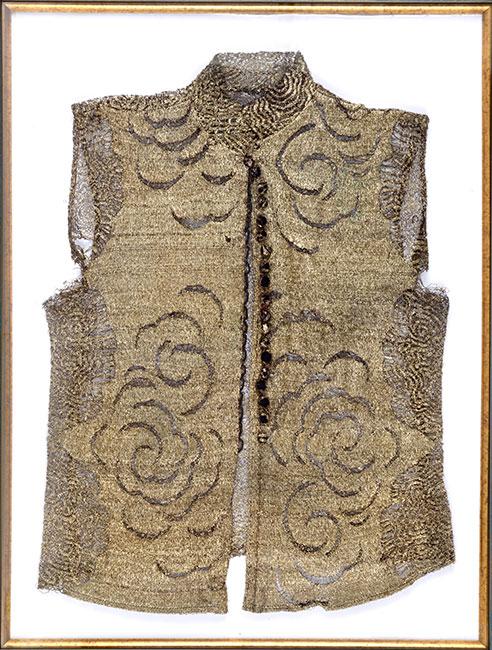 A waistcoat knitted from silver thread by Sol Levi over the course of four years. It is the only item that has remained in the possession of her son Marcel, who survived the Holocaust.