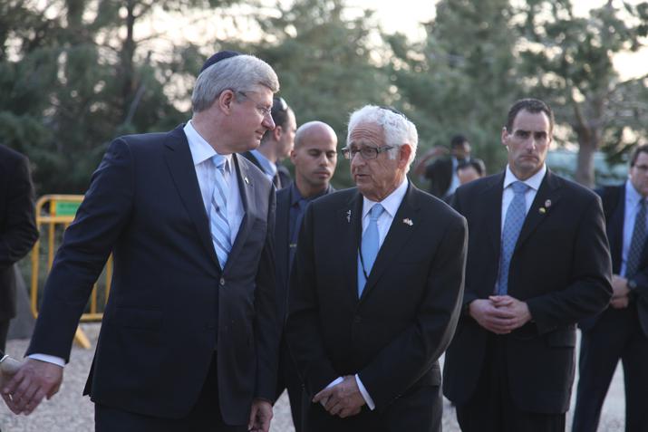 Prime Minister Stephen Harper walks with Vice-Chair of the Canadian Society for Yad Vashem and Yad Vashem Pillar Joseph Gottdenker during his visit to Yad Vashem on 21 January 2014
