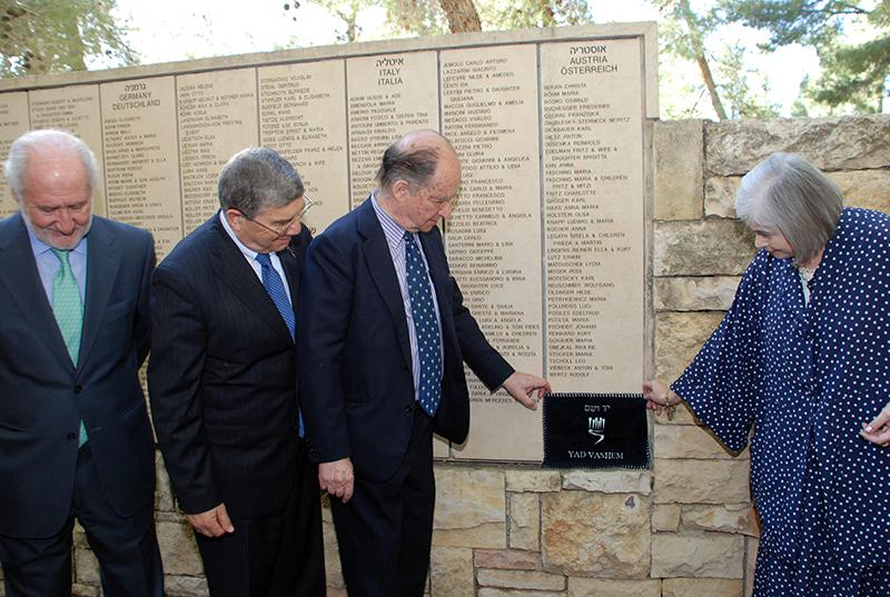 Felipe Propper de Callejon and and Elena Carter, the children of Propper de Callejon, unveil the name of their father on the wall in the Garden of the Righteous, Yad Vashem, 12 March 2008