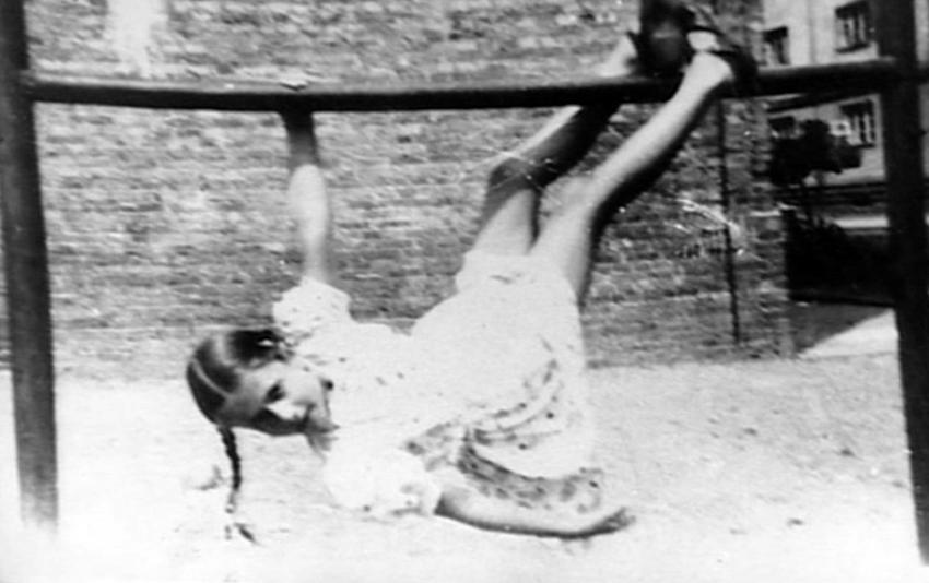 Klara Agatstein playing in the courtyard of the house where she stayed under an assumed identity. Warsaw, summer 1944