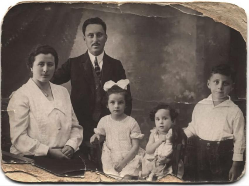 Nikolsburg, Czechoslovakia, circa. 1925. Charlotte and Adolf Hellmann with their three children, Max, Lilly (with ribbon) and Edith.