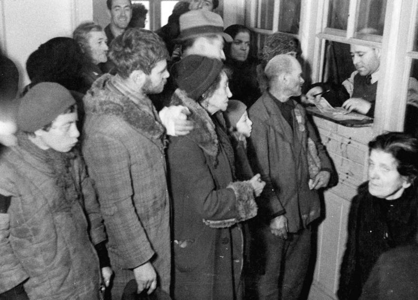 People standing in line to receive funds from self-help organizations. Bucharest, Romania, 1942-44