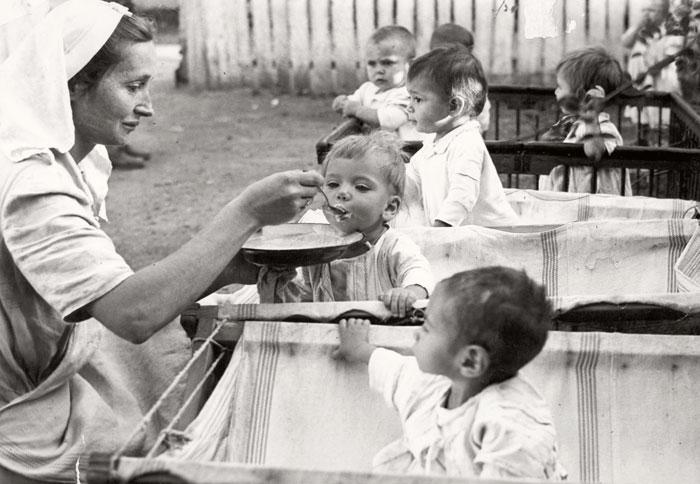 Bucharest, Romania, feeding babies in a shelter of the Organization for Mother and Child Protection, 1943