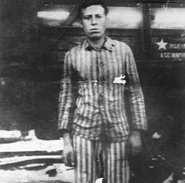 Aharon Zarfati wearing prisoner garb after liberation, 1945