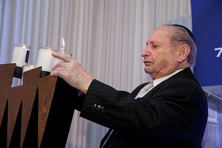 Holocaust survivor Solly Irving lit a memorial candle