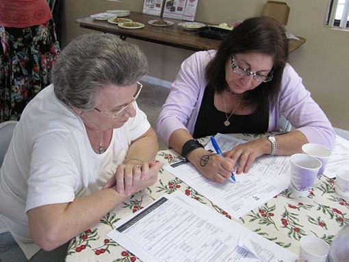 Names Project volunteers assisting submitters of Pages of Testimony in Central Florida, November 2011