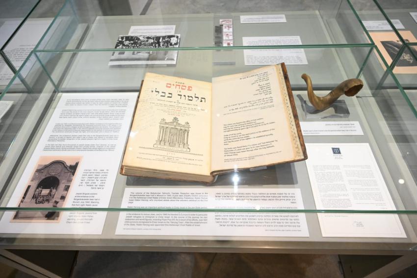 The new display in the Holocaust History Museum featuring a Tractate Pesachim of the Talmud, printed in 1809, and a Shofar that were found in a Nazi cellar in Munich after the Holocaust