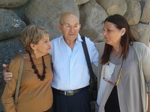 Shoah Victims' Names Recovery Project volunteer Amalia Miodownik pictured with her husband Moshe and Yad Vashem Director General Dorit Novak on Holocaust Martyrs' and Heroes' Remembrance Day, April 2014 at Yad Vashem, Jerusalem