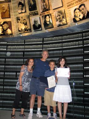 Robin Granat (left) volunteer for Names Recovery Project, Teaneck New Jersey with husband Jay and children Zachary and Heather in the Hall of Names at Yad Vashem, marking their participation in the Yad Vashem Bar/Bat Mitzvah twinning program. August 2008
