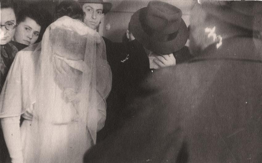 Wedding of Hinda Chilewicz and Welek Luksenburg in the Weiden displaced persons camp. The bride and groom weep during the recitation of a prayer in memory of their parents