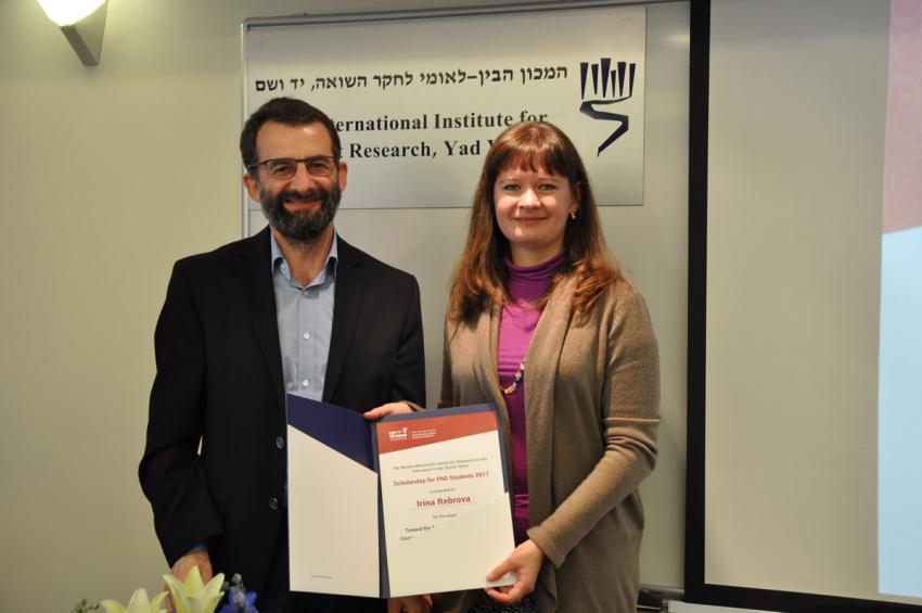 Irina Rebrova  receiving a prize,  with Dr. Arkadi Zeltser