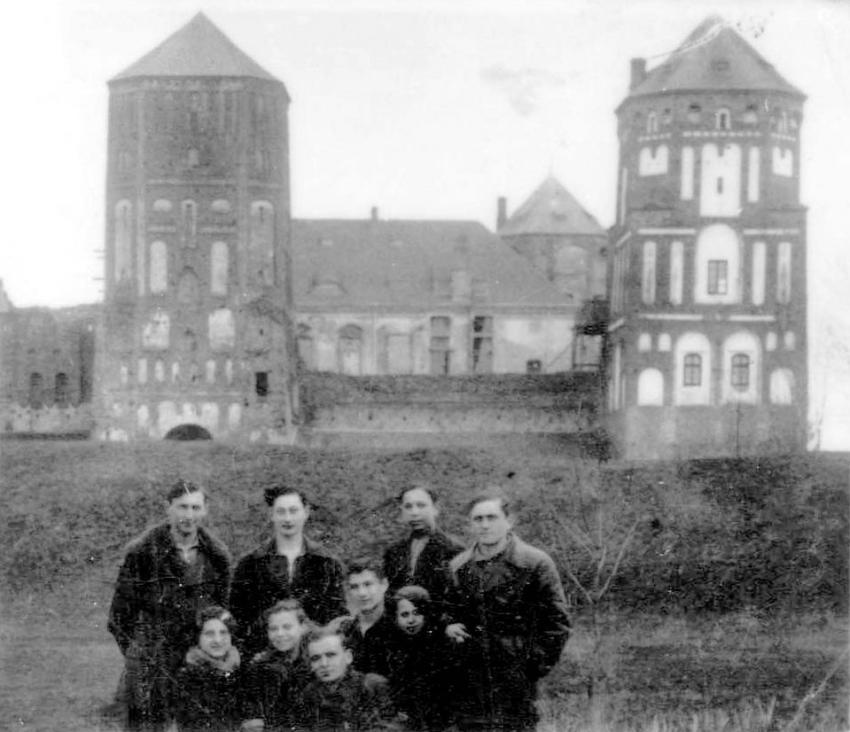 Young people from Mir in front of the Mir palace (&quot;Zamek&quot;, fortress)