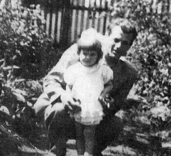 Romek-Reuven Brand with a family member before the war