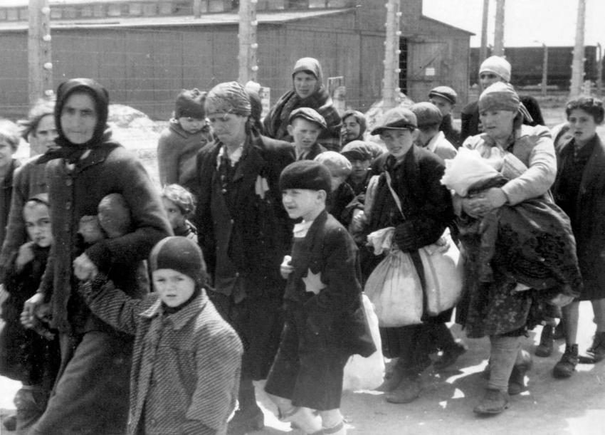 Photo 37: Jewish women and children on their way to death in the gas chambers