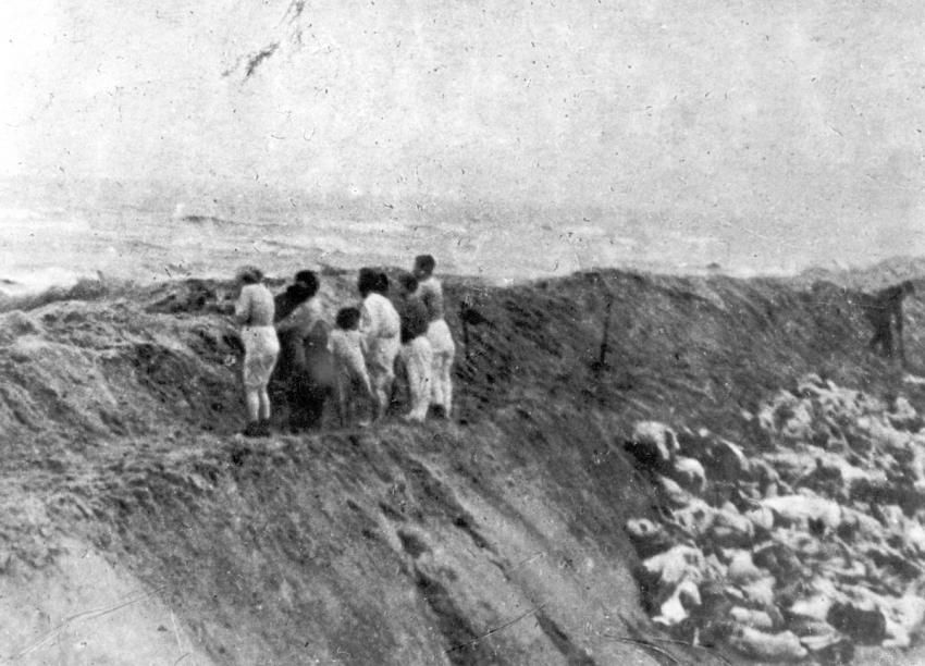 The murder of Jews from Liepāja by Germans and Latvians, next to a pit in the fishing village of Šķēde, Baltic coast, 15 km north of Liepāja,15 December 1941.