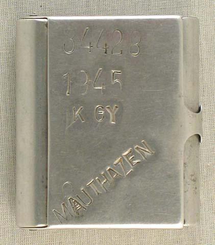 Girla Korenstein的香烟盒，上面有编号和姓名的首字母缩写，此人从南斯拉夫运抵毛特豪森，他的妻子和孩子在战争中生还