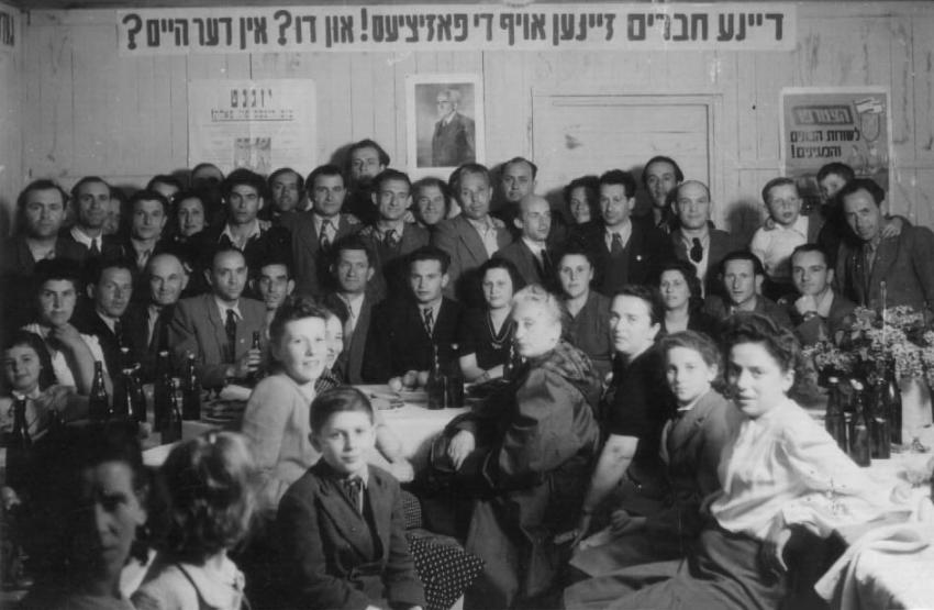 Those who were inducted into the Haganah at Feldafing DP camp. Yecheskel Fleisher is just visible at the back to the left of the photo of Ben-Gurion