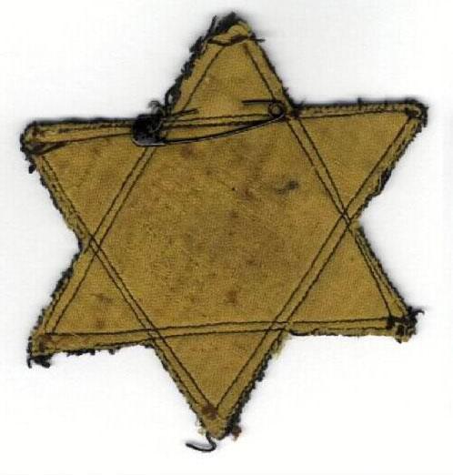 Yellow star Sidonie Asherova received in the collection camp in Sered before she was deported to Theresienstadt