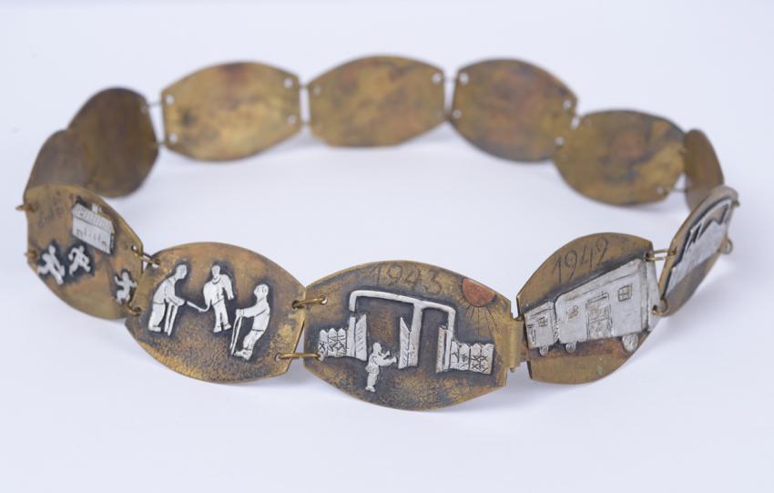 Testimony regarding the plight of prisoners in the Vapniarca camp, as depicted on a metal belt made in the camp