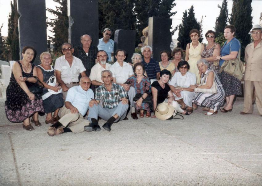 Oswald Rufeisen (center, with a beard) at the Nahalat Yitzhak Cemetery, during the annual memorial ceremony of ex-Mir residents