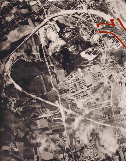 The Plaszow camp as it looked on May 3rd, 1944.The camp is in the center of the photograph, with the quarry to its north. On the top right-hand side, the German photo interpreter has marked the adjacent railway station.