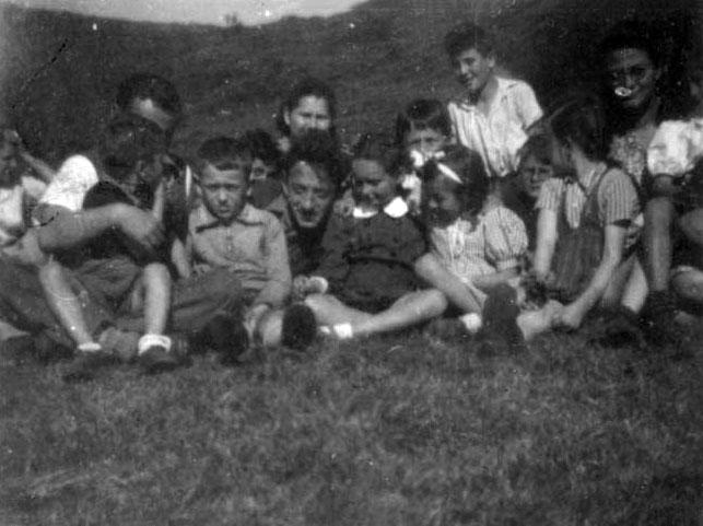 Moshe Zeiri, Director of the Selvino children’s home, with a group of children, Selvino, Italy, after the war.