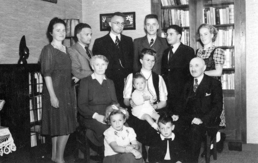 After liberation in 1945. The Nooitgedagt and de Jonge families with three additional Jewish hidden children.
