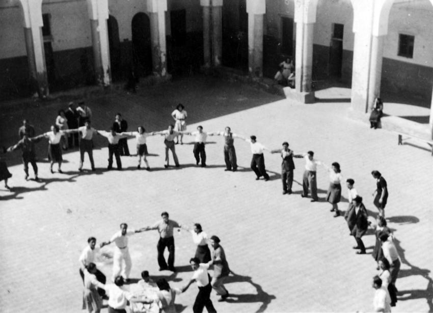 Dancing the “Hora” at the Cremona DP camp, Italy, 1945.