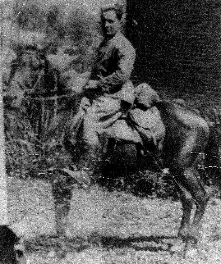 Seated on a horse which had belonged to a German soldier that Alex Folkman captured the night before this picture was taken.